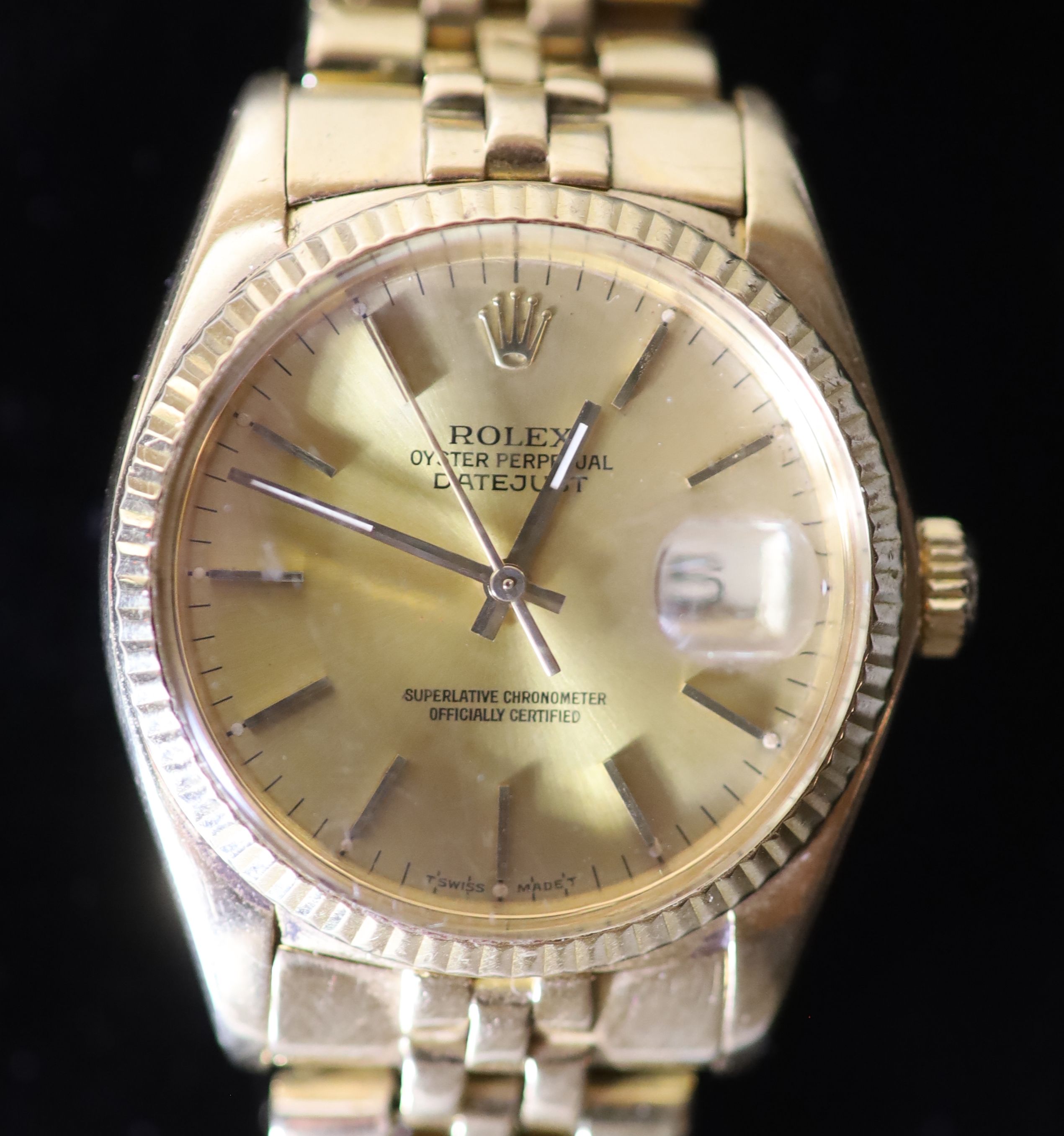 A gentlemans 1990s? 18k gold Rolex Oyster Perpetual Datejust wrist watch, on a 18k gold Rolex bracelet,